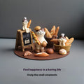 Cute bread cat resin desktop ornament on a minimalist desk