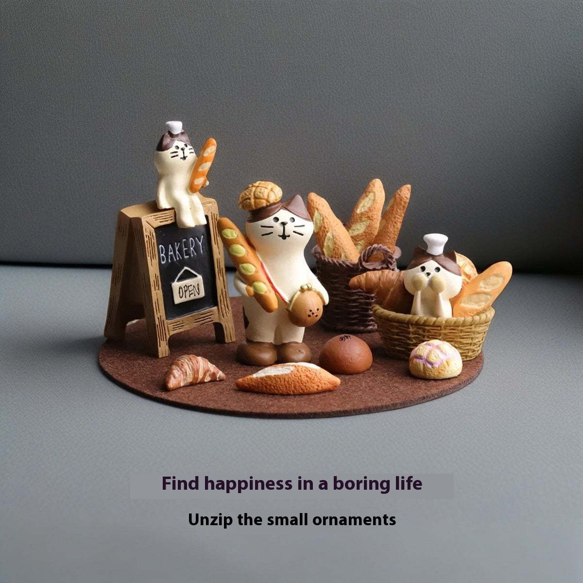 Cute bread cat resin desktop ornament on a minimalist desk