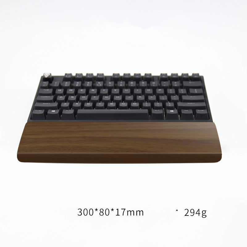 Walnut wrist rest before a compact 60% keyboard, sized 300x80x17mm at 294g – Pausadesk