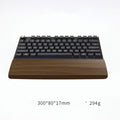 Walnut wrist rest before a compact 60% keyboard, sized 300x80x17mm at 294g – Pausadesk