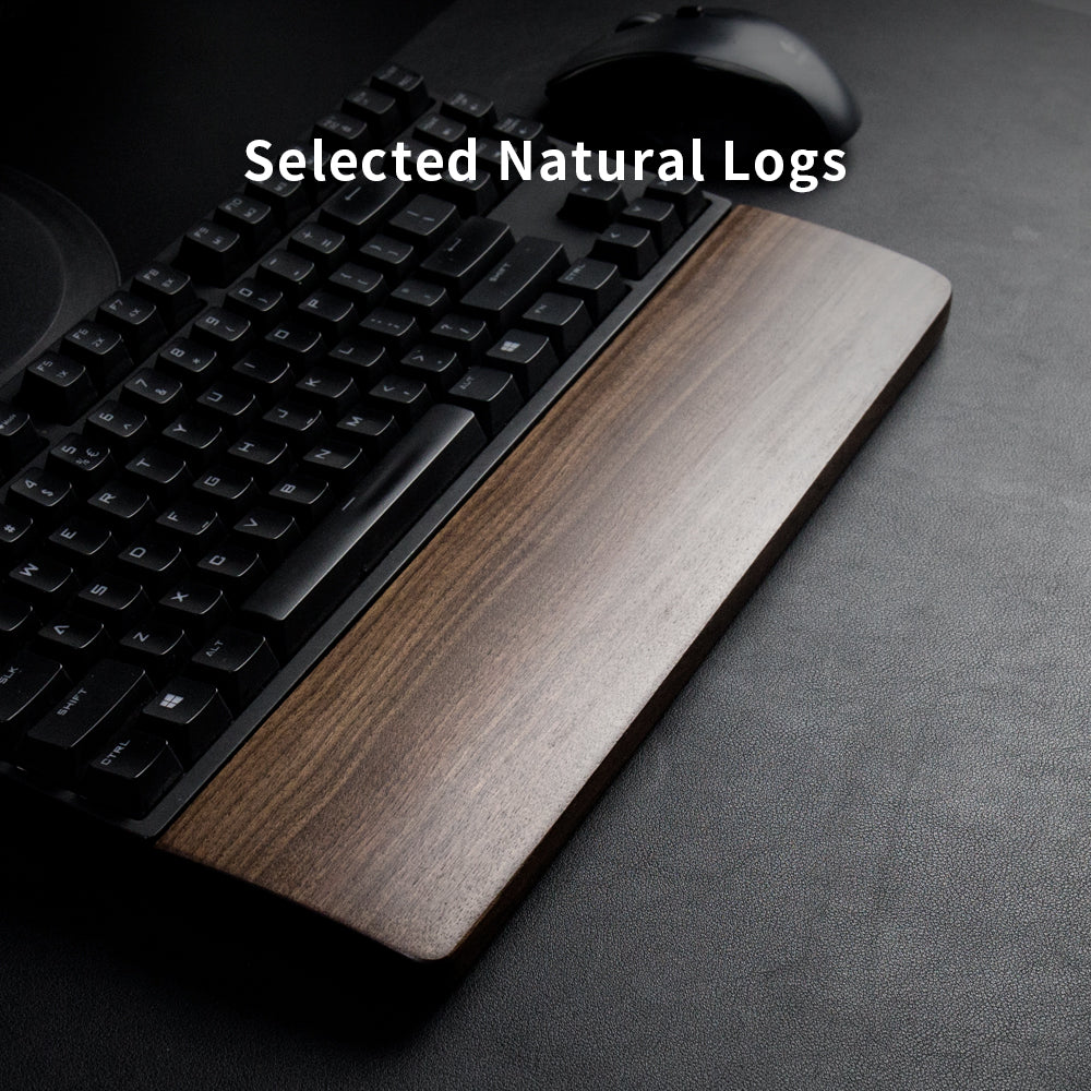 Walnut keyboard wrist rest in front of a mechanical keyboard