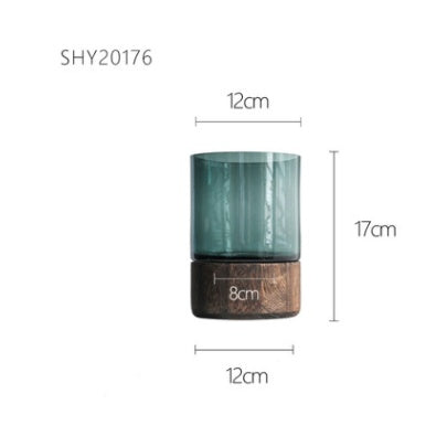 Size chart of green-tinted glass vase with walnut base, marked 12 cm diameter and 17 cm height – Pausadesk
