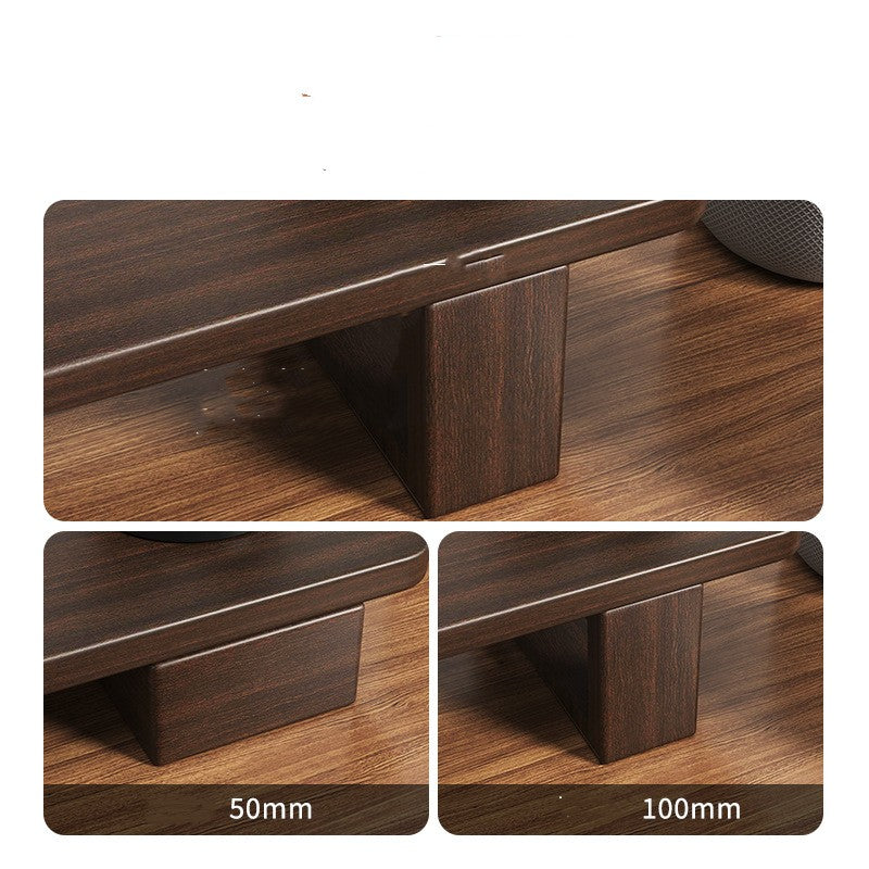 Close-up of walnut monitor riser legs in two height positions