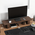 Solid walnut monitor riser lifting a screen with shelf space below